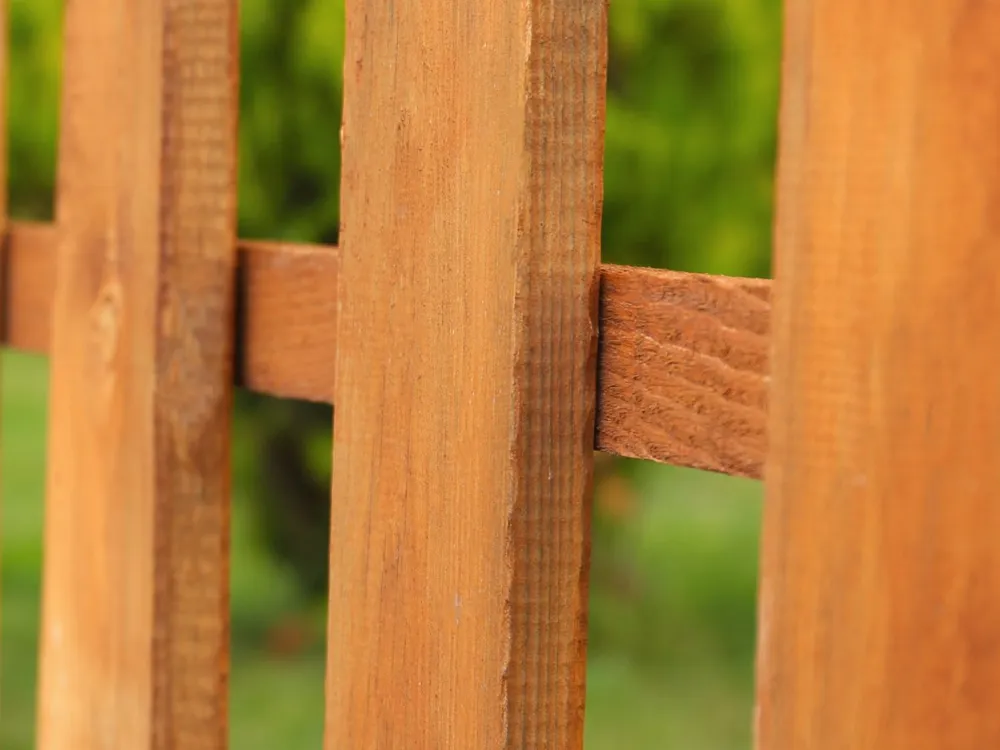Wood picket fence close up